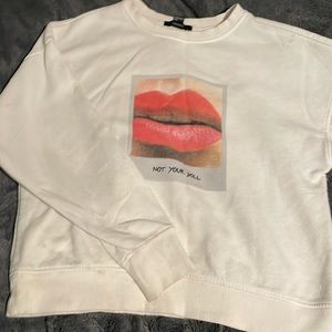 “Not your doll” women’s sweater, size M